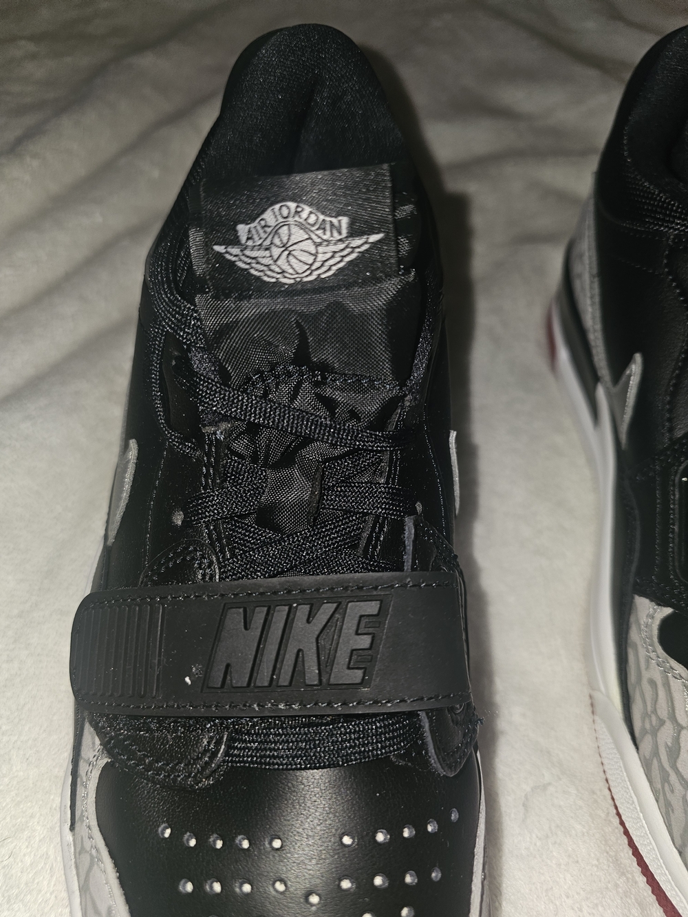 Jordan Black and White Low-Top Sneakers